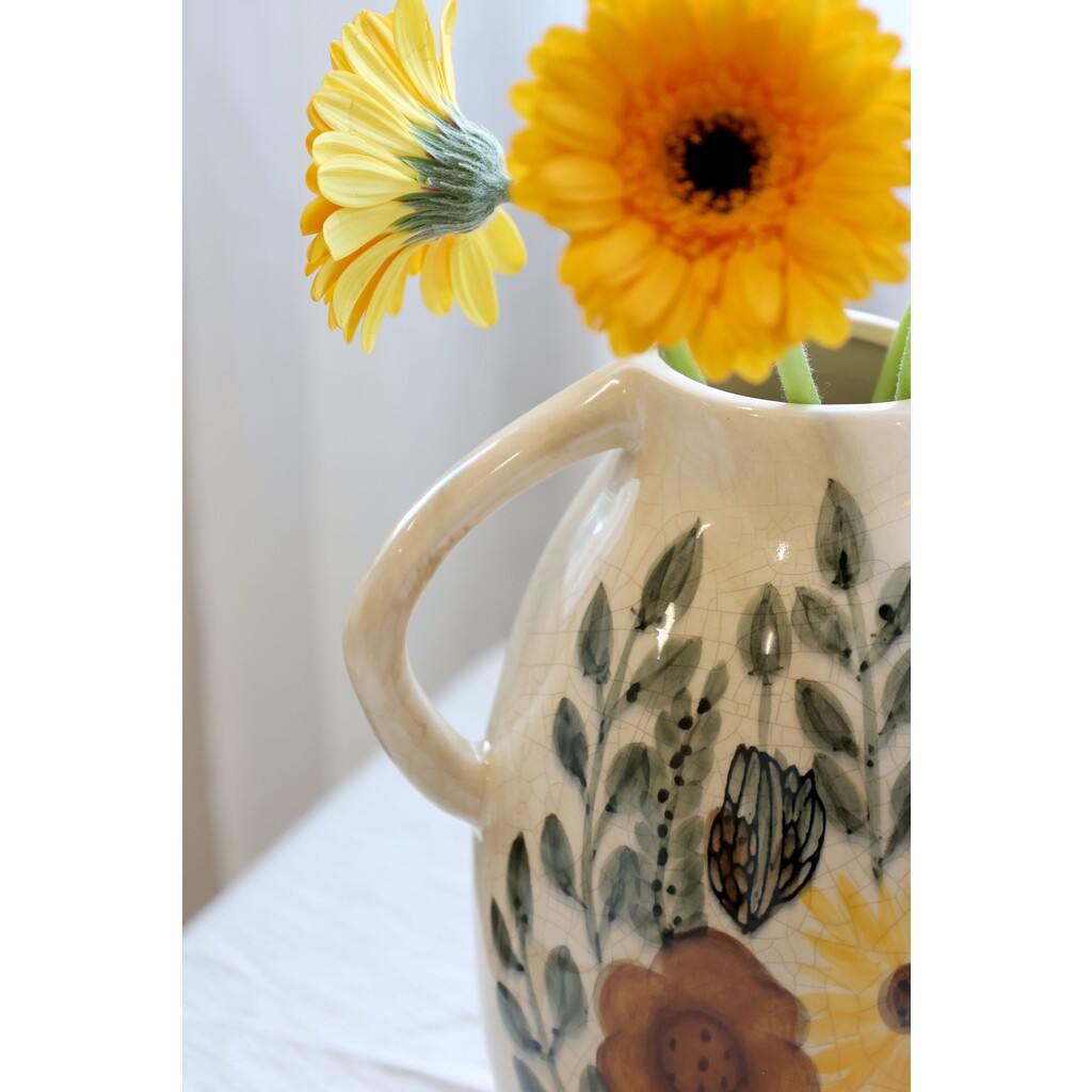 Steingut Kanne mit Blumenmotiv