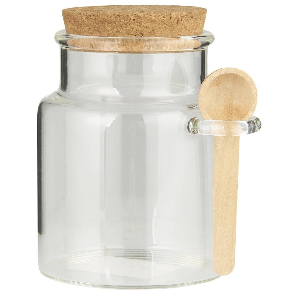 Glaskrug mit Korken und Holzlöffel