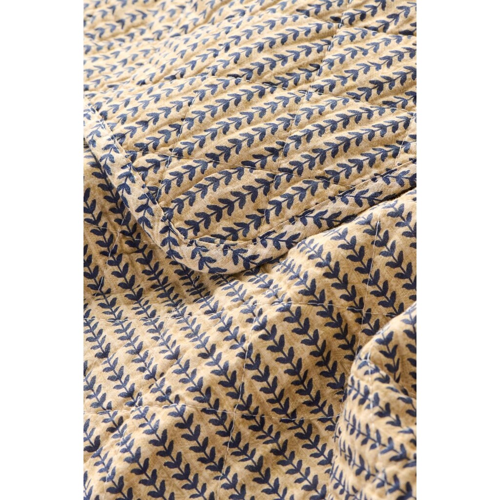 Quilt braun mit dunkelblauen Stängeln