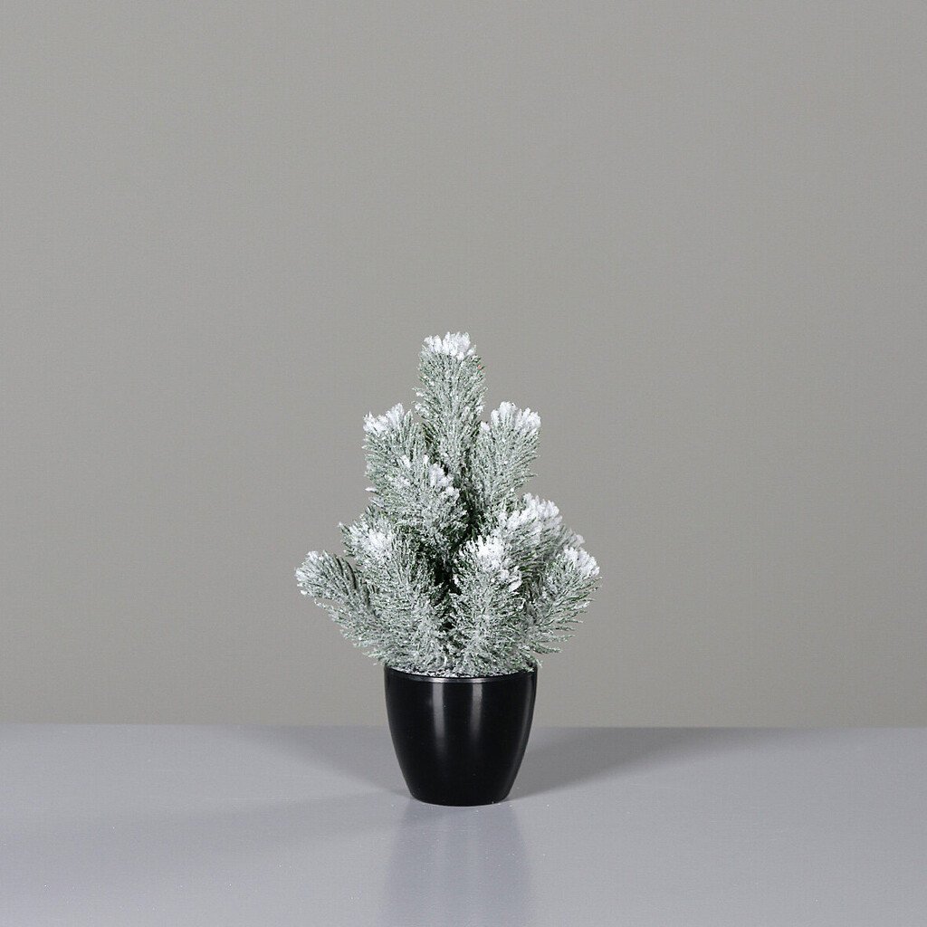 Künstlicher Weihnachtsbaum mit Schnee im Topf